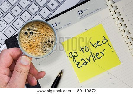 Paper Note With The Words - Go To Bet Earlier - In Business Desk. How To Get Better Concept