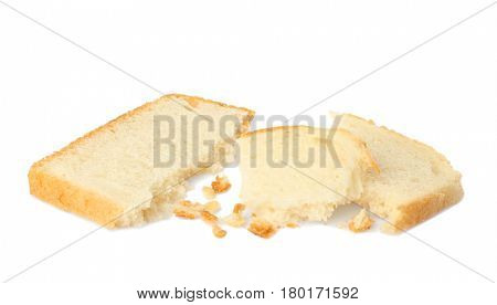 Crumbled pieces of bread isolated on white