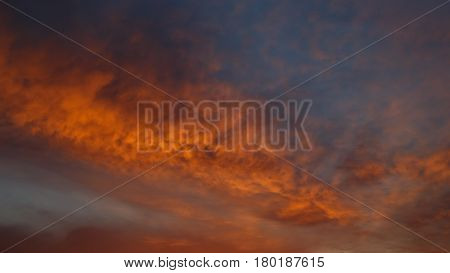 Spring orange and red cloud on the blue sky Halkidiki. Greece
