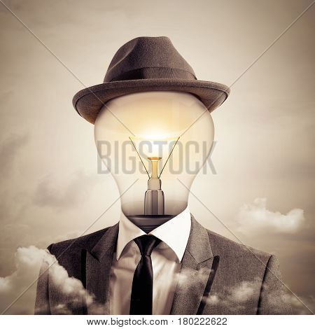 Man with a light bulb as head. Ingenious head concept