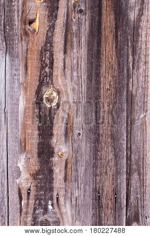 Texture of dark brown old wooden surface