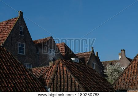 Traditional Dutch old roofs in small village Heusden Noord Brabant