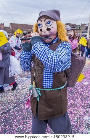 BASEL SWITZERLAND - MARCH 08 : Participants in the Basel Carnival in Basel Switzerland on March 08 2017. The Basel carnival has been listed as one of the top local festivities in Europe