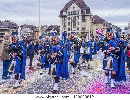 BASEL SWITZERLAND - MARCH 08 : Participants in the Basel Carnival in Basel Switzerland on March 08 2017. The Basel carnival has been listed as one of the top local festivities in Europe