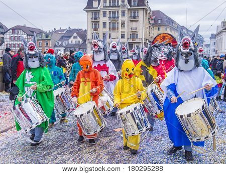 BASEL SWITZERLAND - MARCH 08 : Participants in the Basel Carnival in Basel Switzerland on March 08 2017. The Basel carnival has been listed as one of the top local festivities in Europe