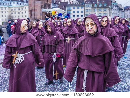 BASEL SWITZERLAND - MARCH 08 : Participants in the Basel Carnival in Basel Switzerland on March 08 2017. The Basel carnival has been listed as one of the top local festivities in Europe