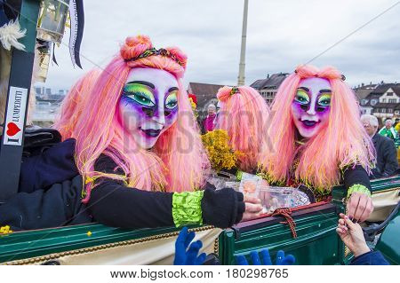 BASEL SWITZERLAND - MARCH 08 : Participants in the Basel Carnival in Basel Switzerland on March 08 2017. The Basel carnival has been listed as one of the top local festivities in Europe