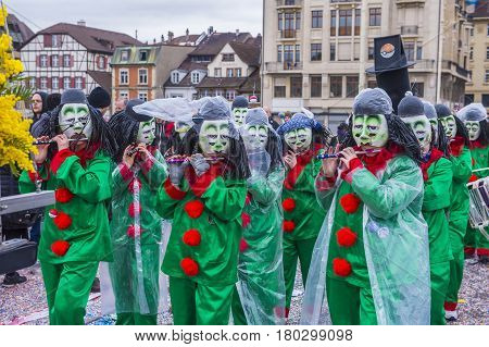 BASEL SWITZERLAND - MARCH 08 : Participants in the Basel Carnival in Basel Switzerland on March 08 2017. The Basel carnival has been listed as one of the top local festivities in Europe
