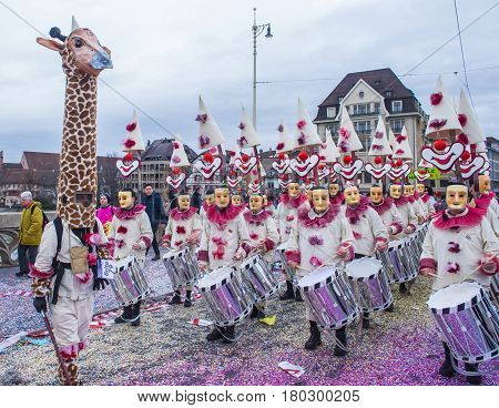 BASEL SWITZERLAND - MARCH 08 : Participants in the Basel Carnival in Basel Switzerland on March 08 2017. The Basel carnival has been listed as one of the top local festivities in Europe