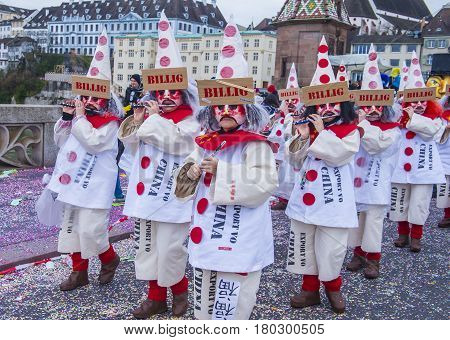 BASEL SWITZERLAND - MARCH 08 : Participants in the Basel Carnival in Basel Switzerland on March 08 2017. The Basel carnival has been listed as one of the top local festivities in Europe