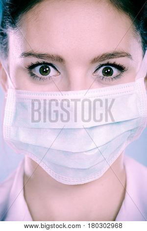 Portrait Of Female Doctor In Mask
