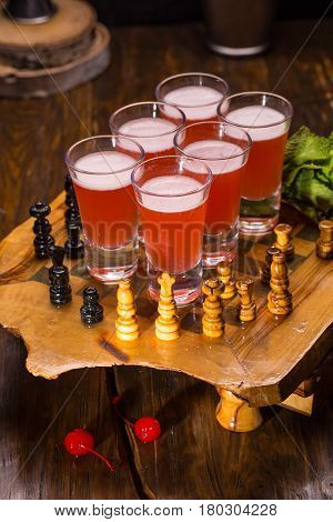 A set with gin, cointreau, an angostura, syrup vinshevy syrup and pineapple juice