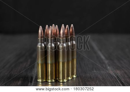 Group of  ammunition geometrically placed in rows