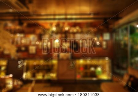 blur cafe background with bokeh effect, defocus warm tone retail shop backdrop