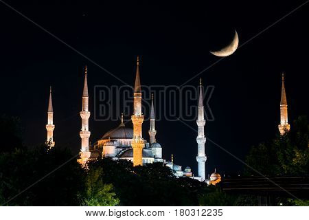 View of the Blue Mosque (Sultanahmet Camii) at night with Crescent, Istanbul, Turkey