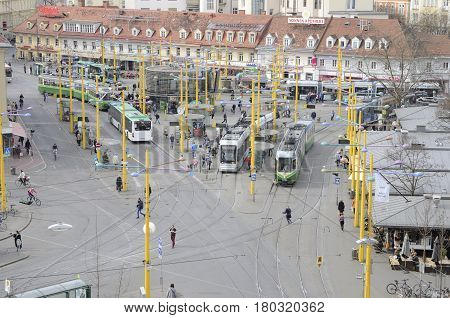 GRAZ, AUSTRIA - MARCH 20, 2017: Hub of Public trams at Jakominiplatz in Graz the capital of federal state of Styria Austria.