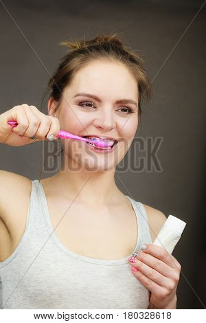 Woman Brushing Cleaning Teeth