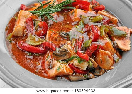 Chicken cacciatore in plate, closeup