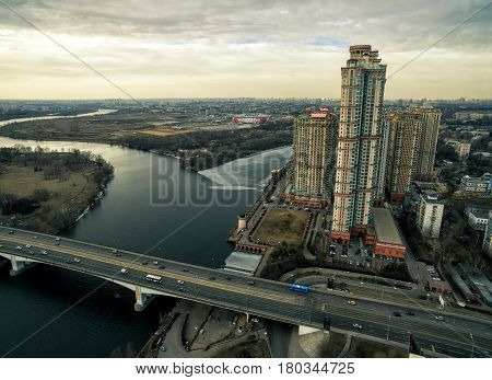 Aerial view of Moscow at sunset. Residential complex Alye Parusa over Moskva River. Moscow, Russia.