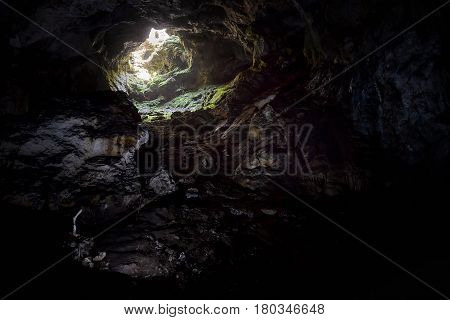 Entrance to the karst cave in a mountain