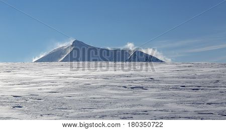 Beautiful rocky mountain peak covered by snow in the Alps close to Mont Blanc Massif. View from Col de Voza (1650m) to Le Prarion (1969m)