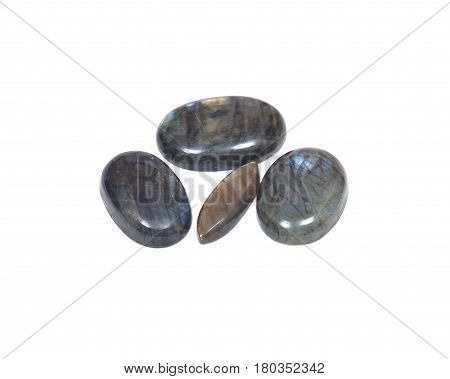 Labradorite cabochons free-form from Madagascar isolated on white background