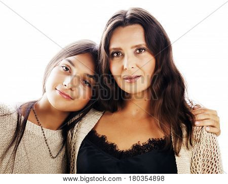 cute pretty teen daughter with mature mother hugging, fashion style brunette, lifestyle people concept close up