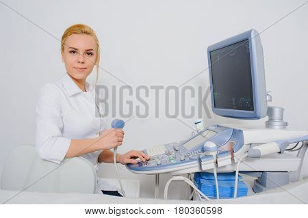 Doctor Working At Ultrasound Diagnostic Machine
