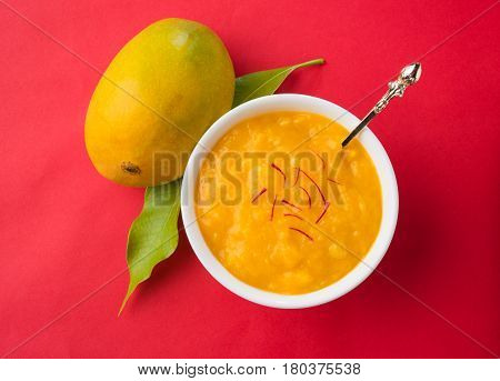alphonso mango pulp or hapus aam ras or amba ras in marathi, selective focus
