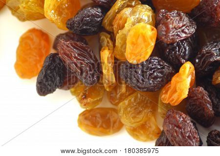 Raisin / A raisin is a dried grape. Raisins are produced in many regions of the world and may be eaten raw or used in cooking, baking, and brewing.