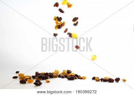 Raisin / A raisin is a dried grape. Raisins are produced in many regions of the world and may be eaten raw or used in cooking, baking, and brewing