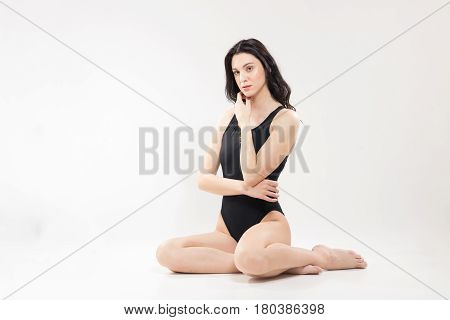 One Young Woman, Body Sitting