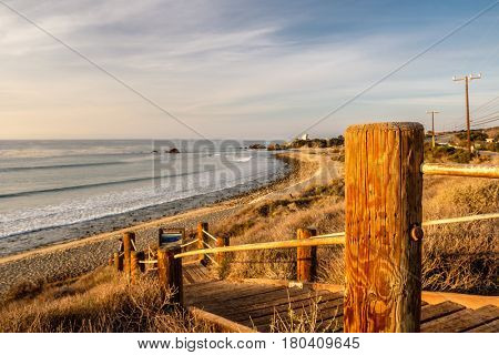 USA Pacific coast landscape, boardwalk to Leo Carrillo State Beach, Malibu, California.