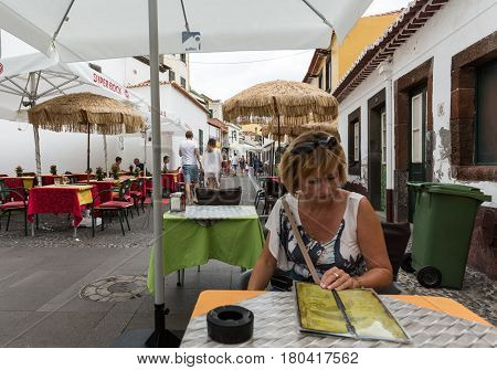 FUNCHALMADEIRA PORTUGAL SEPTEMBER 4 2016: Zone Velha - the oldest district famous for its best restaurants and cafes in Funchal. Madeira Portugal