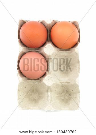 Organic eggs in paperboard egg cartons isolated on white