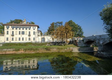 Cassinetta di Lugagnano (Milan Lombardy Italy): facade of the historic Villa Visconti Maineri along the canal known as Naviglio Grande of Turbigo