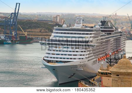 Valletta Malta - March 1 2017: Front view of MSC Splendida luxury cruise ship moored in Maltese port Valletta