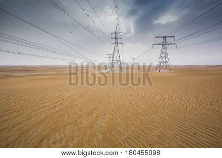 Power Line In A Desert Near Abu Dhabi