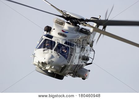 ROTTERDAM NETHERLANDS - SEP 3 2016: Royal Netherlands Navy NH90 helicopter flying during the World Harbor Days in Rotterdam.