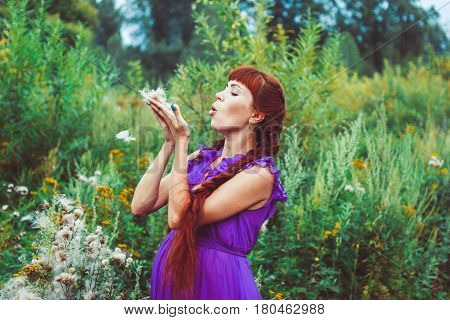 Beautiful woman playing with her dog. Outdoor portrait. series
