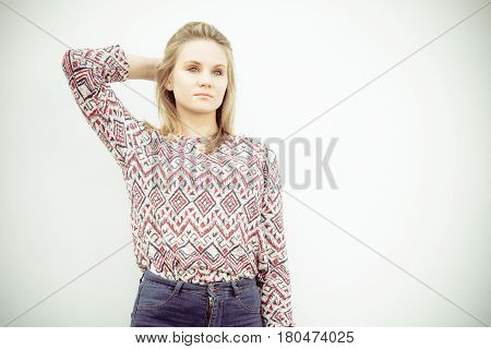 Fashion and style. Beauty young blondie woman posing outdoors. Gorgeous fashionable model wearing stylish clothes.