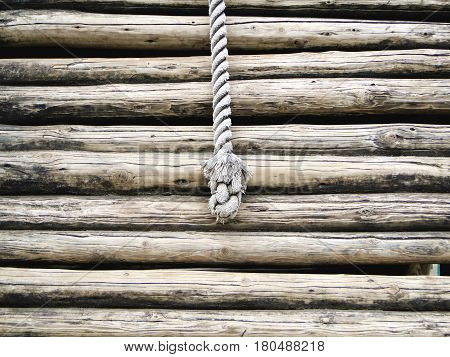 An old rope on the old wood