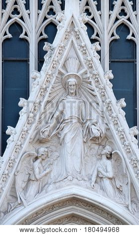 ROME, ITALY - SEPTEMBER 02: Sacred Heart of Jesus between two Angels, Sacro Cuore del Suffragio church in Rome, Italy  on September 02, 2016.