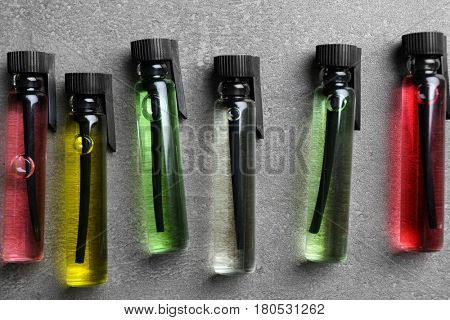 Perfume samples on gray background