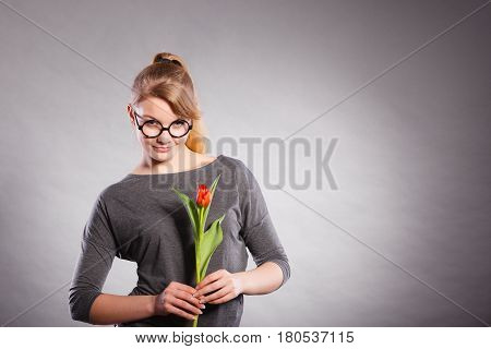 Beauty Woman With Tulip Flower.