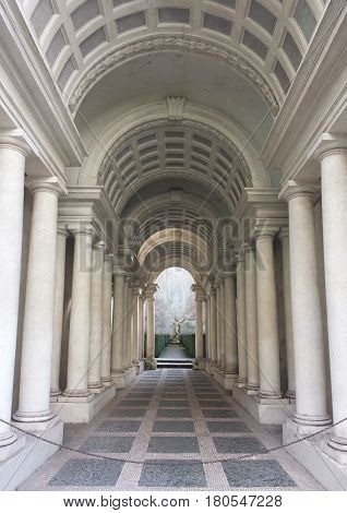 ROME ITALY - FEBRUARY 1 2015: Palazzo Spada the forced perspective gallery by Francesco Borromini. The baroque corridor is only nine meters long but looks much longer