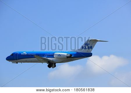 Amsterdam the Netherlands - April 2nd 2017: PH-KZM KLM Cityhopper Fokker F70 takeoff from Polderbaan runway Amsterdam Airport Schiphol