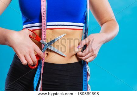 Woman Pinching Waist For Skin Fold Test
