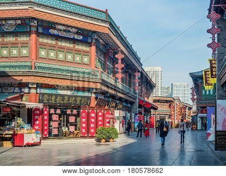 Tianjin, China - Nov 1, 2016: Tianjin Ancient Cultural Street; a shop preserved in the classical Qing Dynasty architectural style. Morning scene to what is a very popular tourist area.