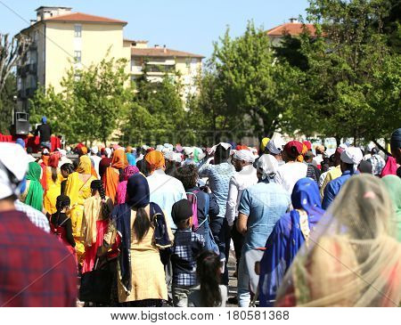 Vicenza, Vi, Italy - April 8, 2017: People Sikh Procession Pray During A Religious Nagar Kirtan Fest